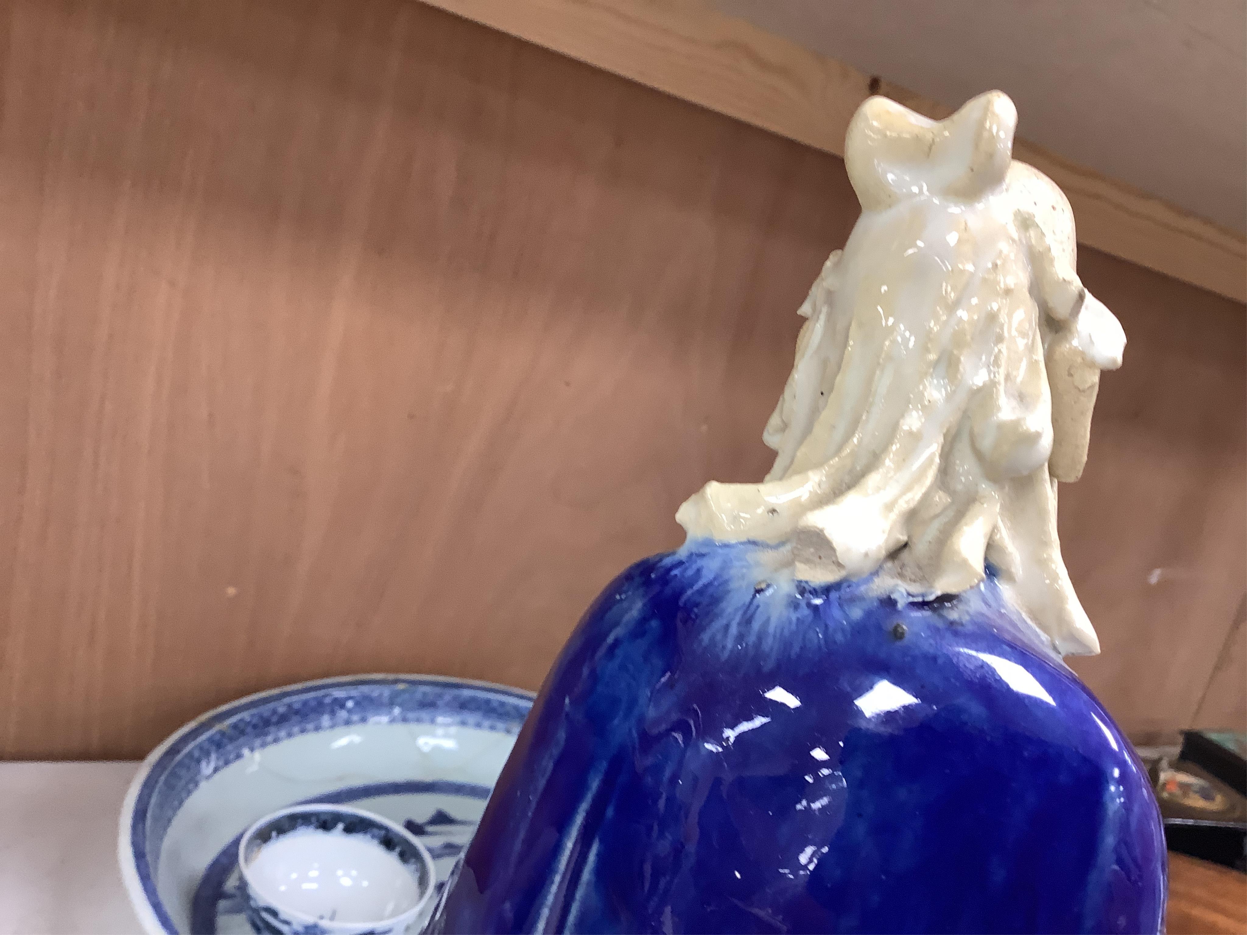 Two Chinese pottery glazed figures to include a Shiwan mudman, largest 48cm high